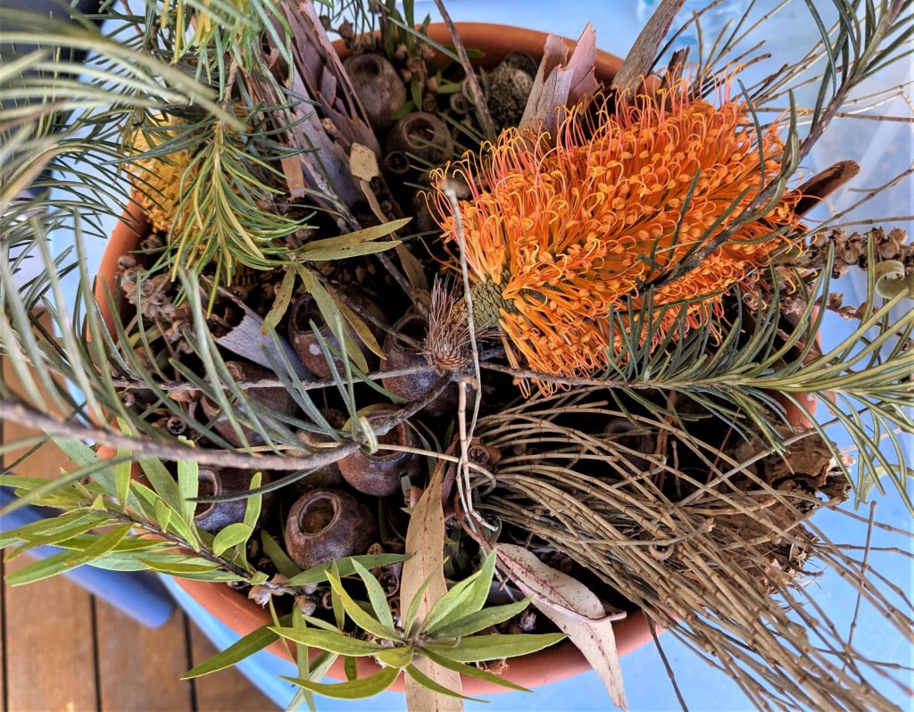 Insect hotel in terracotta pot